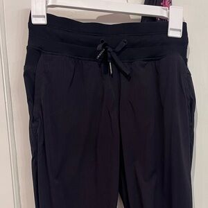 Lululemon size 2 jogger style pinstripe capri pants with included headband